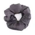 Dark grey satin stuffed hair scrunchie detail shot, soft fabric and fluffy design texture. - Deep purple
