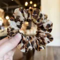 Leopard print satin hair scrunchie detail close up, soft fabric ponytail holder hair accessory. - M / Yellow Brown Leopard