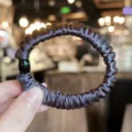 Dark grey satin scrunchie hair tie for women, elegant elastic ponytail holder accessory. - S / Deep purple