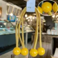 Kleurrijke lange elastische haarrekkers met gele kralen voor meisjes kinderhaaraccessoires - Gele ronde bal