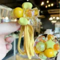 Leuke gele haarelastiek voor kinderen met kristalparels en elastisch touw, prachtig. - Geel