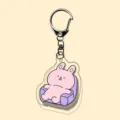 Acrylic cartoon keychain detail, cute pink animal on sofa, transparent double-sided pendant. - A12-21