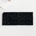 Black wide elastic headband embellished with sparkling rhinestones and starry rhinestone details. - Black