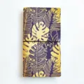 Traveler notebook with tropical leaf pattern, PU leather journal, elastic band closure. - Abundant Flowers