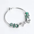 Bracciale in argento con bellissimi cristalli verdi scintillanti e fiocco elegante. - 18cm / Fiocco Verde (#2)