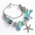 Bracciale con ciondoli stella marina fiore blu stile oceano, catena serpente moda. - 17cm / Celeste