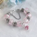 Bracciale con ciondoli in argento con cristalli sfaccettati rosa e perline cuore donna. - Rosa-18CM