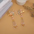 Traditional Chinese style Hanfu hair clips featuring glass flowers, pearls, and cute tassels. - Bright Pink