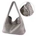 Metallic silver woven leather shoulder bag with stylish knot detail and soft hobo design. - Silver Gray with Pendant