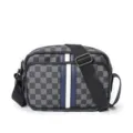 Detailed view of the stylish men's checkered crossbody bag with blue and white vertical stripe. - Black Checkerboard