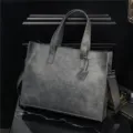 Dark grey PU leather tote bag with shoulder strap, stylish commuter handbag for daily use. - Matte Gray