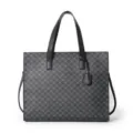 PU leather tote bag detailed view showcasing classic monogram pattern and premium black handles. - Monogram Black