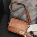 Men vintage brown leather crossbody bag casual messenger shoulder bag with a wide adjustable strap. - Earthy Yellow