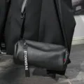 Black cylindrical crossbody bag for men and women, casual stylish shoulder bag with strap. - Black Upgraded