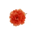 Detailed view of orange polyester artificial peony flower petal texture and vibrant color close up. - Orange