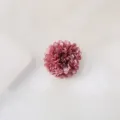 Close up of the 4cm dusty pink fabric flower hair clip detail, elegant bridal photo accessory. - Dusty Pink