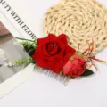 Detail view of red velvet rose hair comb with silver teeth, elegant bridal floral hair accessory. - Red