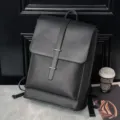 Zaino nero minimalista in pelle, grande borsa da viaggio e per la scuola da uomo e studenti. - Nero