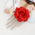 Halloween gothic skeleton hand rose hair clip, unique spooky design for cosplay party. - Red