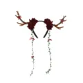 Detailed view of Christmas reindeer antler headband featuring red roses, green vines and bows. - Burgundy