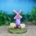 Miniature resin windmill and sheep ornament detail showing delicate craft for sandbox design. - Purple Windmill