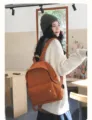 Minimalistische canvas rugzak met grote capaciteit voor dagelijks reizen en schoolgebruik. - S / Roodbruin