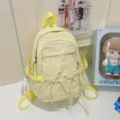 Yellow casual backpack for women, large capacity commuter school bag with cute bow ties and pockets. - Yellow