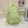 Casual green backpack for women, large capacity travel school bag with cute ribbon decor. - Green