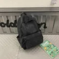Stylish black backpack large capacity casual travel school bag for students and outdoor. - Black