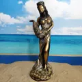 Detailed close-up view of the exquisite resin prosperity goddess statue with gold coins. - Fortune Goddess B (500-600g)