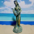 Detailed close-up view of the goddess of wealth resin statue featuring cornucopia and coins. - Fortune Goddess E (500-600g)