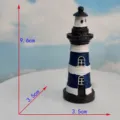 Detailed view of the Mediterranean style miniature lighthouse resin ornament with blue and white finish. - Dark Blue 9.6cm High