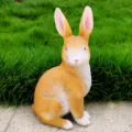 Detailed view of the resin rabbit figurine for garden decoration, showing texture and size. - Yellow Rabbit