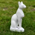 Ancient Egyptian Bastet cat resin figurine detailed view showing fine carved ornaments. - White