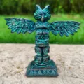 Close-up of the vintage resin totem owl figurine with carved details, textured bronze finish. - Bronze Totem