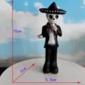 Halloween skeleton figurine wearing sombrero hat, resin ghost ornament for holiday party decor. - Karaoke Skeleton
