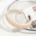 Vue détaillée du serre-tête beige rembourré avec joli motif d'ours, accessoire de cheveux doux. - Imprimé Géométrique Beige