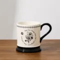 Vintage ceramic coffee mug with black handle, retro floral pattern design, 400ml capacity. - 301-400ml / Orchid - Color Box