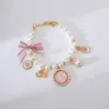 Pet pearl necklace variant with cute pink bow and retro pendants for small dogs like Teddy. - S / Pink