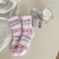 Cozy pink coral fleece fuzzy socks with cute Fair Isle winter pattern for warm home wear. - One Size / Light Pink