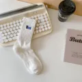 White ribbed mid-calf socks with blue dog embroidery, comfortable cotton casual wear. - One Size / Puppy White