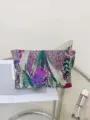 Detailed view of large capacity embroidered floral cosmetic pouch, portable toiletry travel bag. - M / Purple Forest Floral