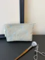 Elegant light blue rose embroidered cosmetic bag, portable travel makeup pouch for women. - Embossed Rose Blue Medium