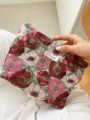 Detailed view of floral jacquard cosmetic pouch, elegant fabric makeup bag for women. - L / Red White Pink Floral