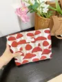 Mushroom print canvas cosmetic bag detail view, portable zipper makeup pouch, fabric storage. - Red Large