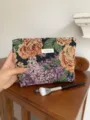 Vintage floral embroidered makeup pouch detail shot, showing exquisite tapestry texture and fabric. - L / Black Purple Floral