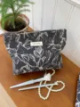Large capacity dark grey floral cosmetic bag with zipper, portable makeup organizer pouch. - L / Black Floral