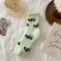 Cozy coral fleece mid-tube socks in light green with cute cow spots for warm winter home wear. - One Size / Grass Green