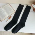 Black solid color ribbed long socks for women, slim fit Japanese JK style hosiery. - One Size / Black
