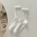 White cable knit mid-calf socks for women featuring cute ruffles, breathable and soft. - One Size / Pure White